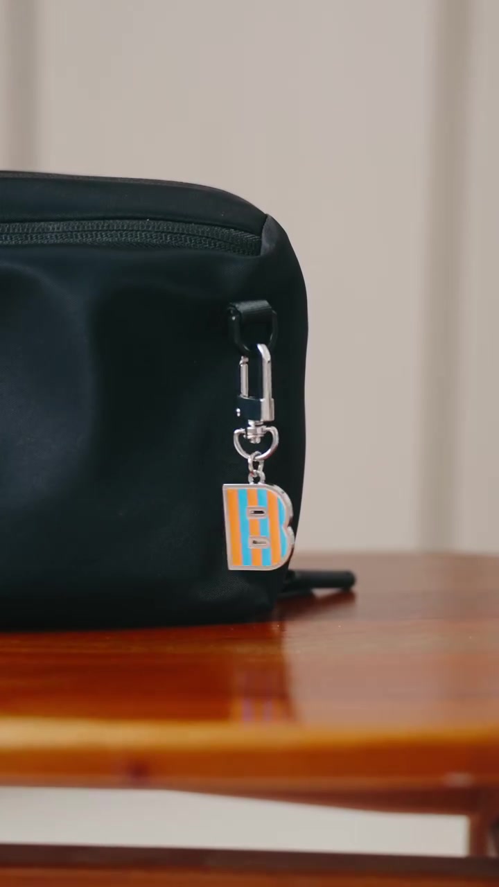 samsonite — Limited edition charms from HK$98 each or 2 for HK$150; add-on pricing with luggage purchase.