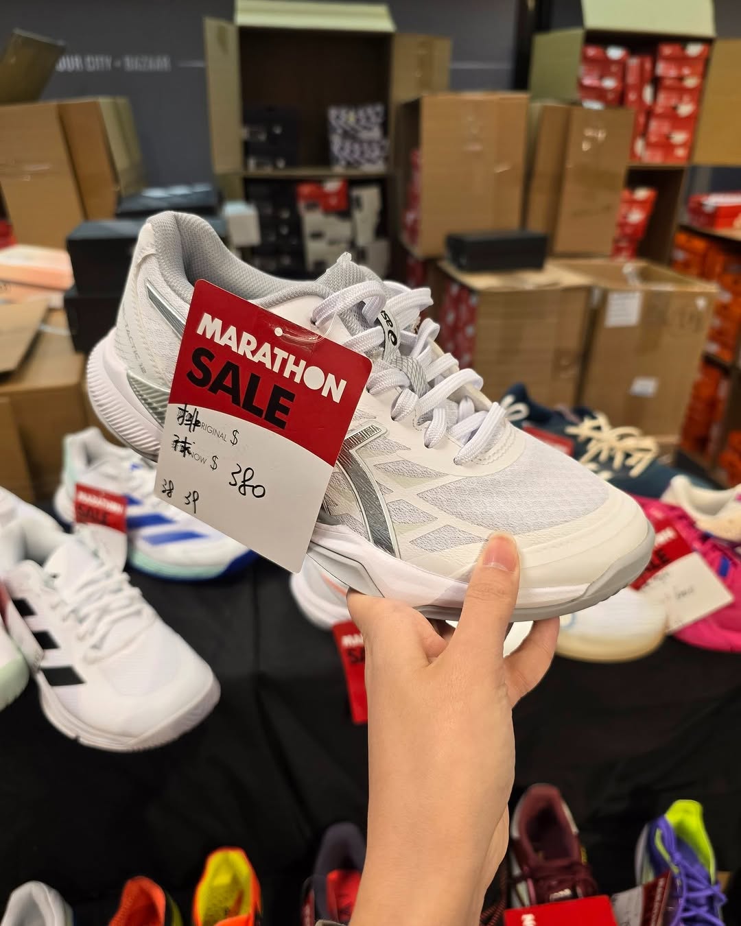 Harbour City Bazaar — Marathon sportswear mega sale with tiered discounts: selected items at fixed prices, buy 2 get 10% off or buy 3 get 20% off on red-tagged items.