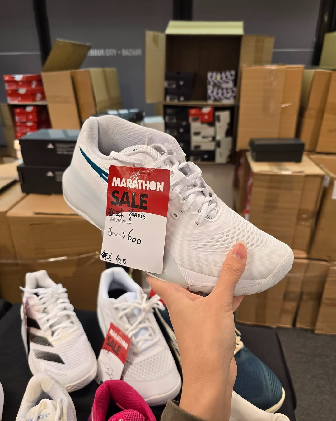 Harbour City Bazaar — Marathon sportswear mega sale with tiered discounts: selected items at fixed prices, buy 2 get 10% off or buy 3 get 20% off on red-tagged items.