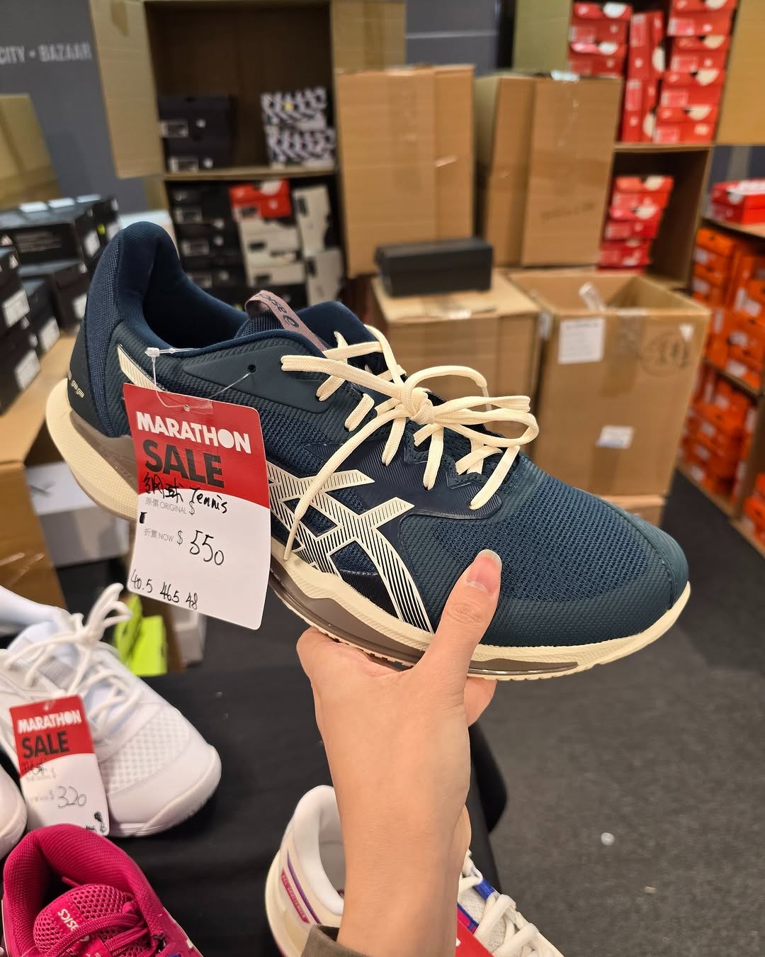 Harbour City Bazaar — Marathon sportswear mega sale with tiered discounts: selected items at fixed prices, buy 2 get 10% off or buy 3 get 20% off on red-tagged items.