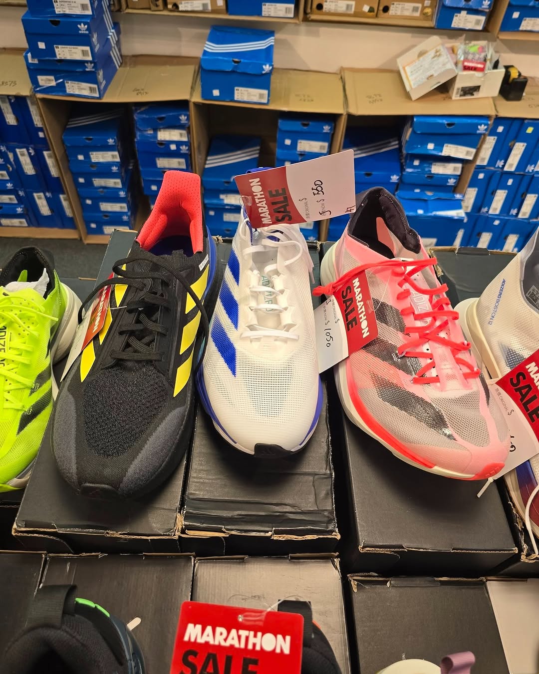 Harbour City Bazaar — Marathon sportswear mega sale with tiered discounts: selected items at fixed prices, buy 2 get 10% off or buy 3 get 20% off on red-tagged items.