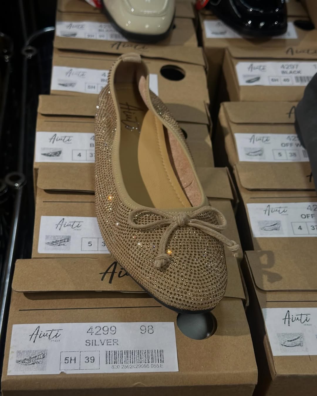 Bazaar (Times Square) — Warehouse sale featuring electronics, books, and casual apparel with discounts up to 80% off and fixed prices on selected items.