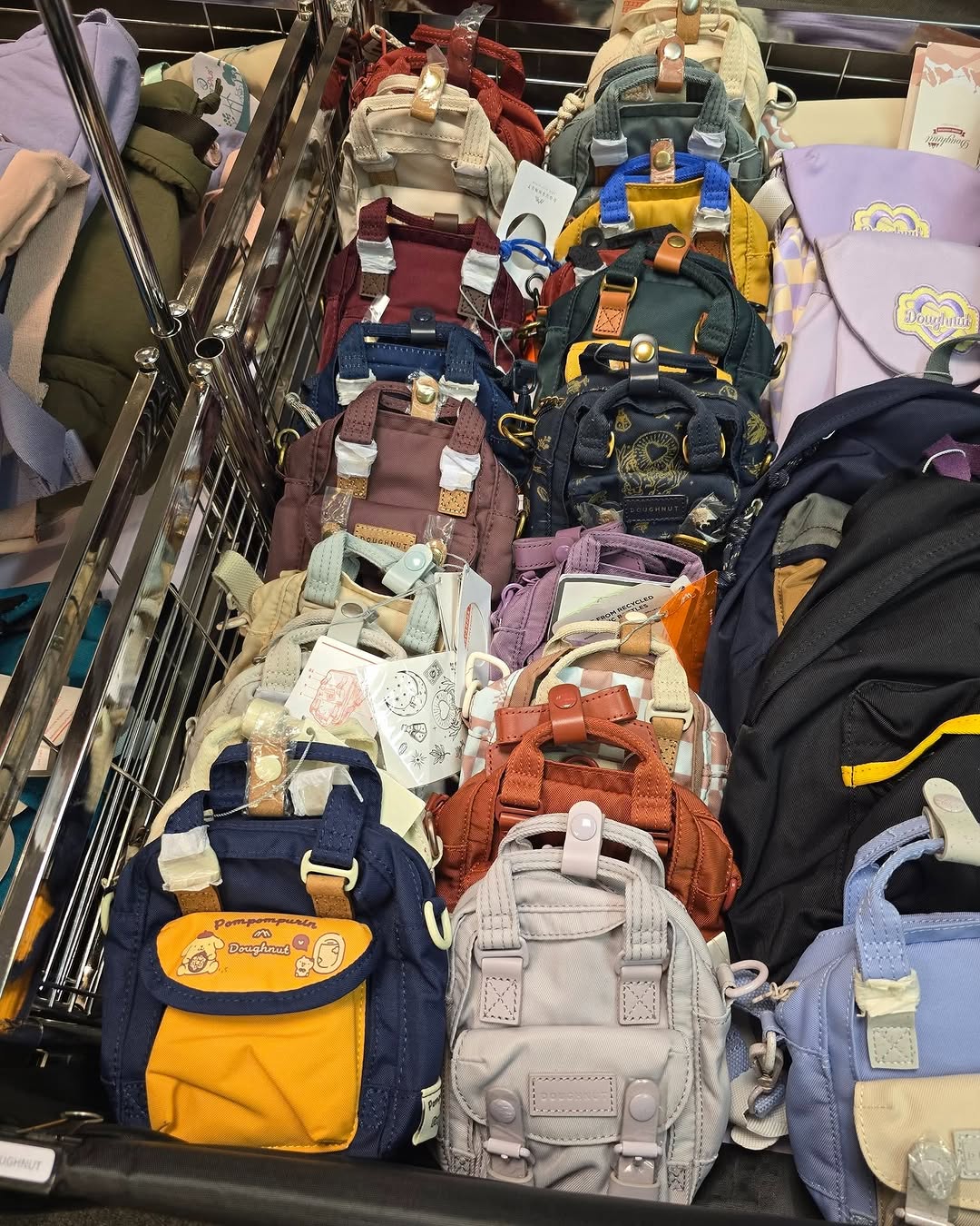Harbour City Bazaar — Branded fashion warehouse sale with discounted children's shoes from HK$80 and DOUGHNUT apparel at 30% off, with tiered discounts up to 15% off for multiple purchases.