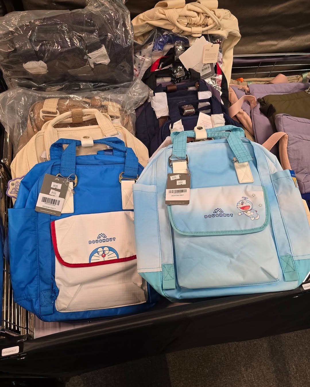 Harbour City Bazaar — Branded fashion warehouse sale with discounted children's shoes from HK$80 and DOUGHNUT apparel at 30% off, with tiered discounts up to 15% off for multiple purchases.