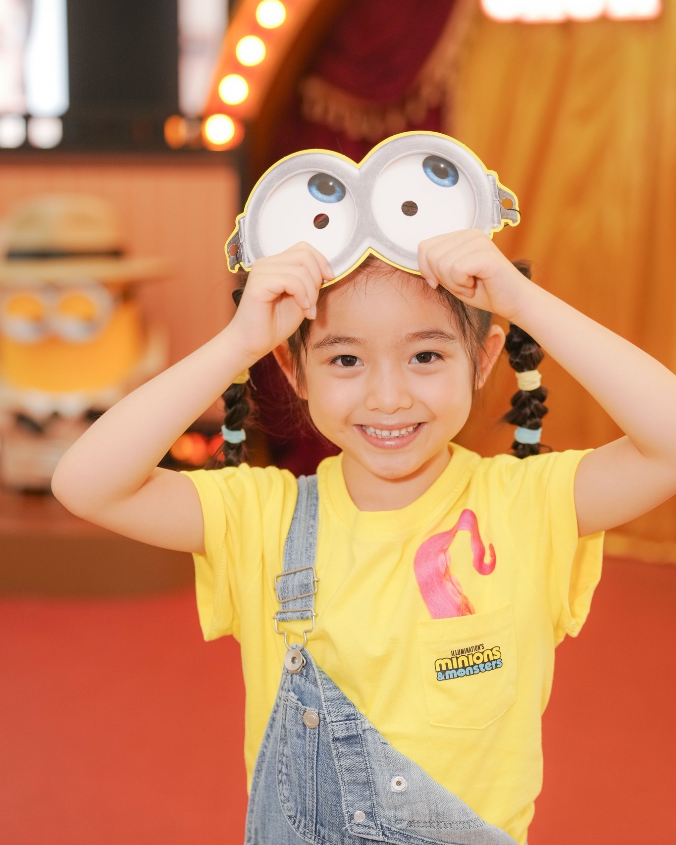 times square — Complete 2 missions and spend HK$300+ to earn free Minions movie voucher, paper goggles, and exclusive fan (first 300 members).