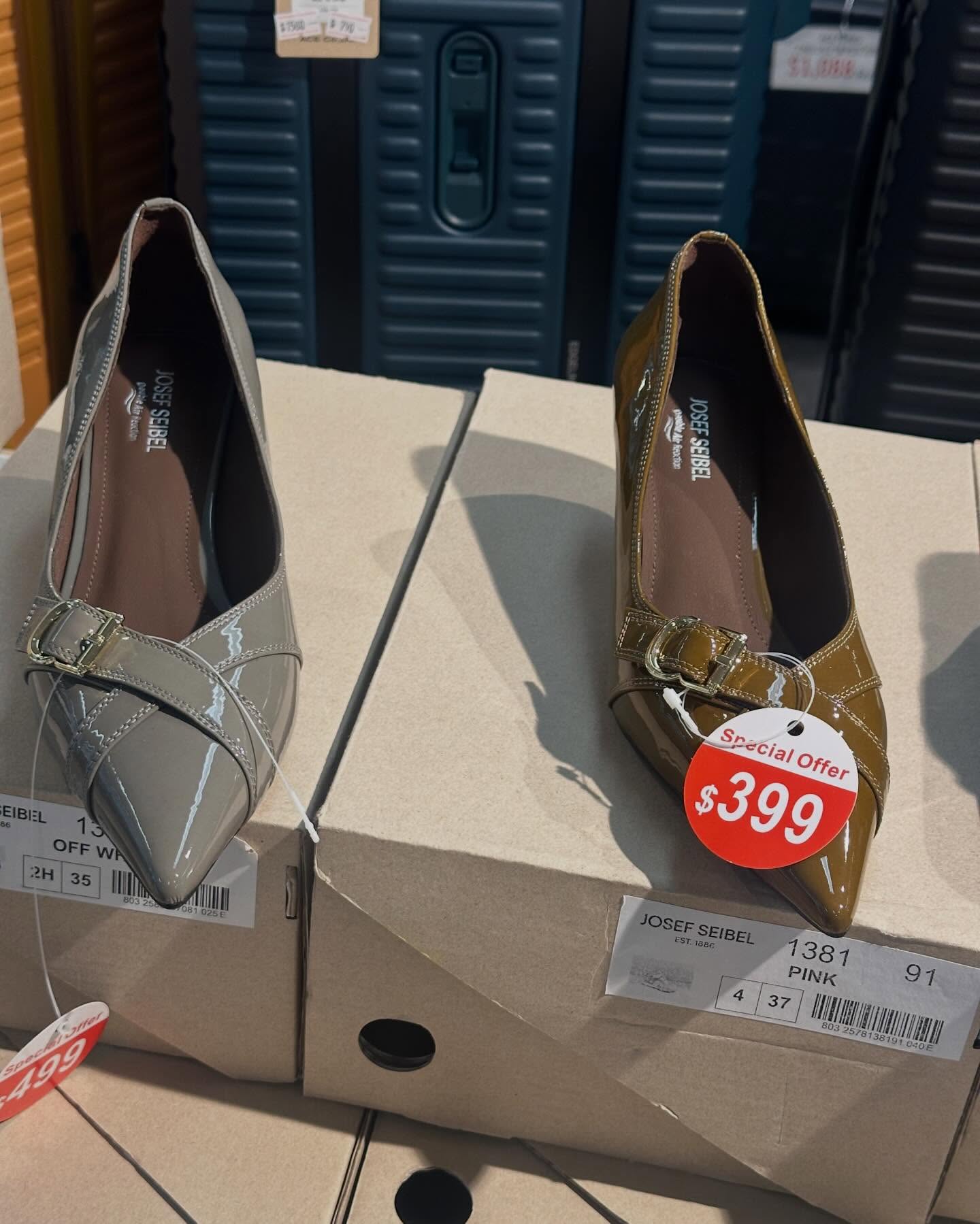 Times Square Bazaar — Sports and leisure wear sale with selected items up to 60% off. Featured items include women's clothing from $699, umbrellas at $139, scarves from 40% off, and men's/women's shoes from $299.