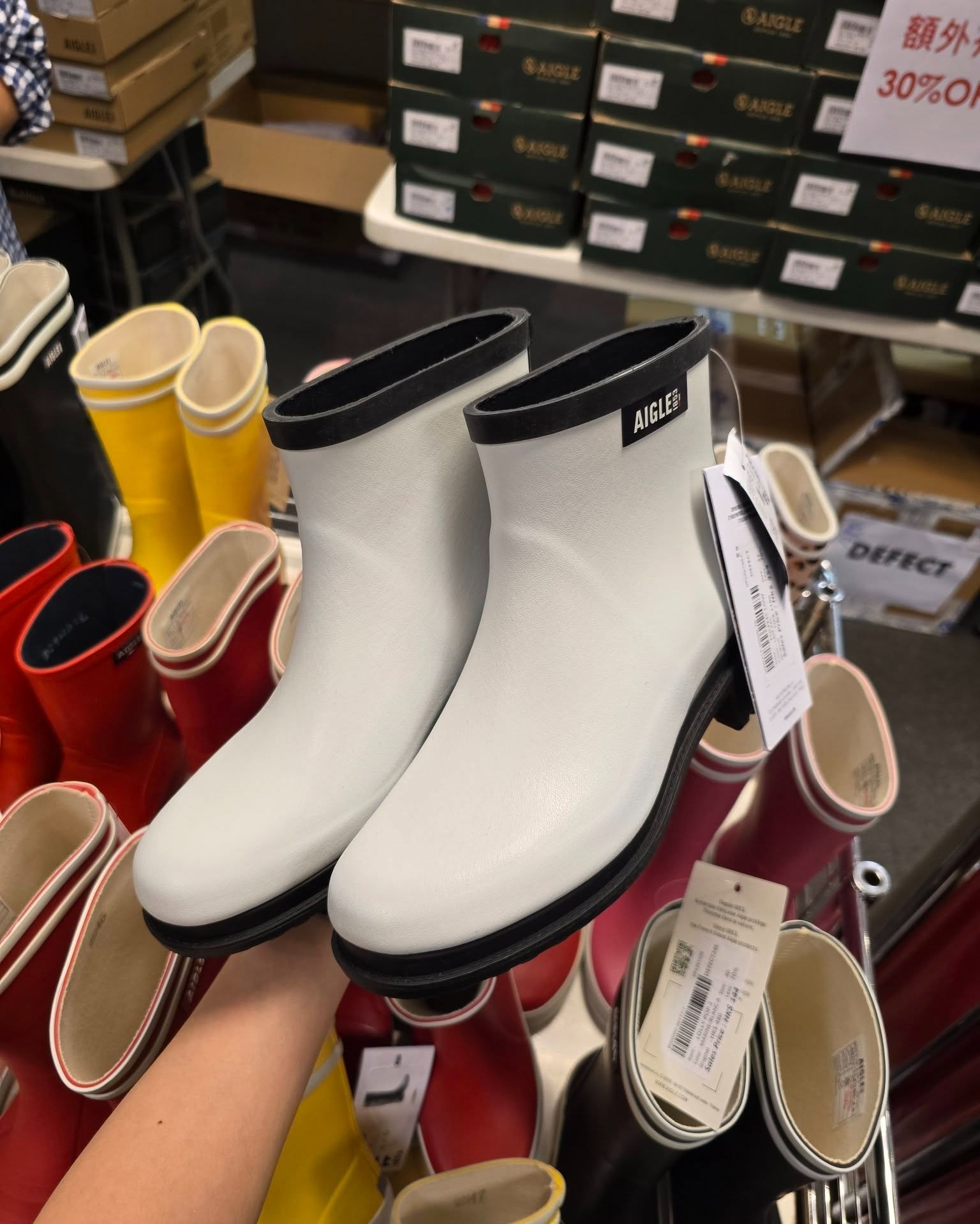 Harbour City Bazaar — AIGLE summer warehouse sale with fixed pricing on apparel and additional discounts on outerwear/accessories when buying 2+ items.