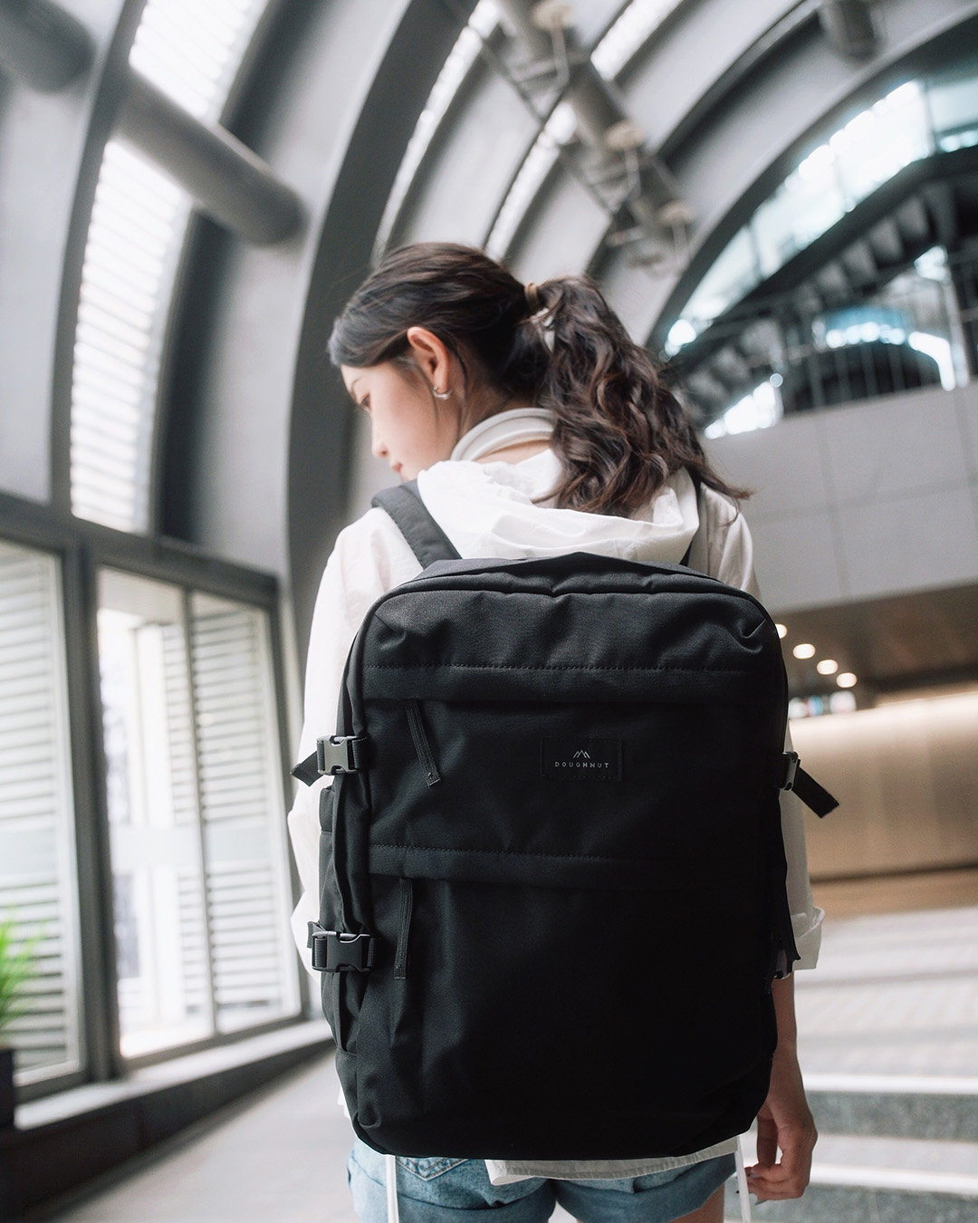 Doughnut — All full-priced products at 12% off. Redeem travel pin badge with code 'gotravel'.