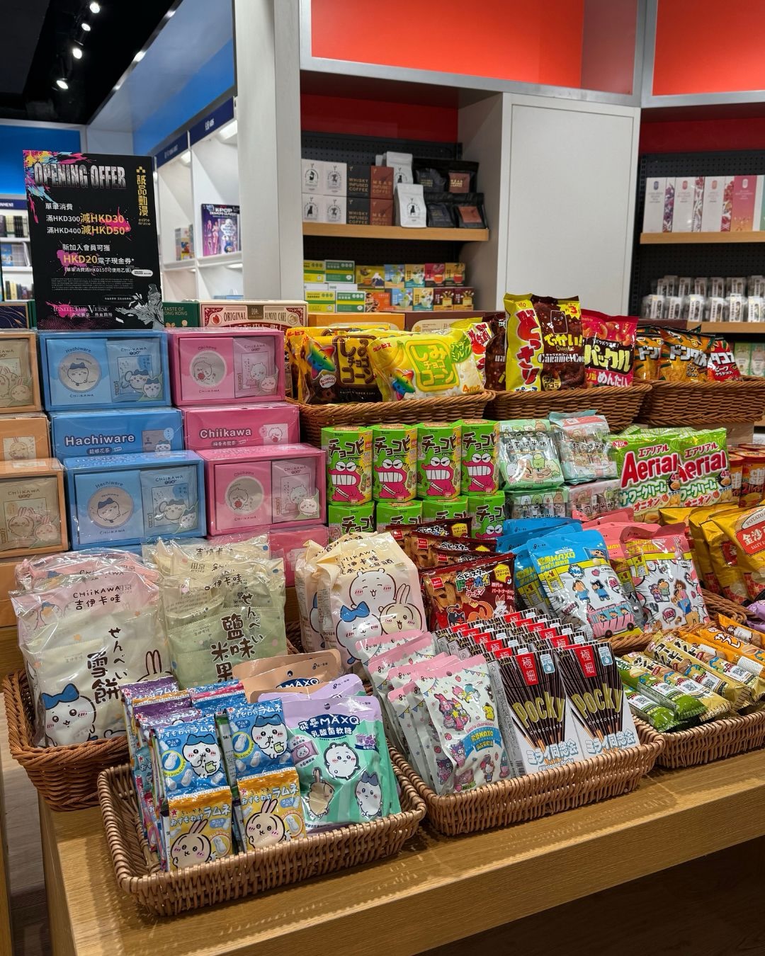 eslite — Soft opening exclusive: free bookmark with HKD180 spend, up to HKD50 cashback on HKD300–400 purchases, 10% off with anime outfit, HKD50 off on second visit.