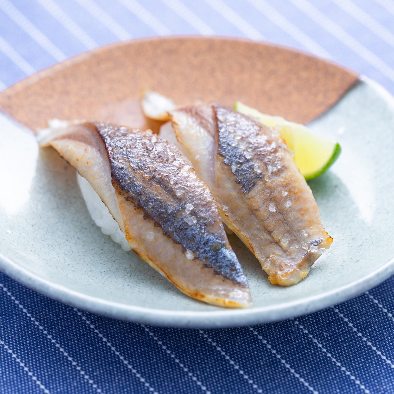 四款秋日限定壽司，採用日本食材，每件HK$15至HK$22。
