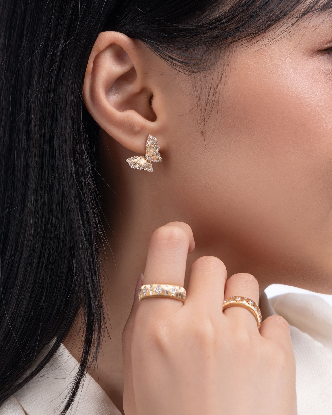 Full-priced diamond earrings in the Satin Romance collection at 15% off during promotional period.