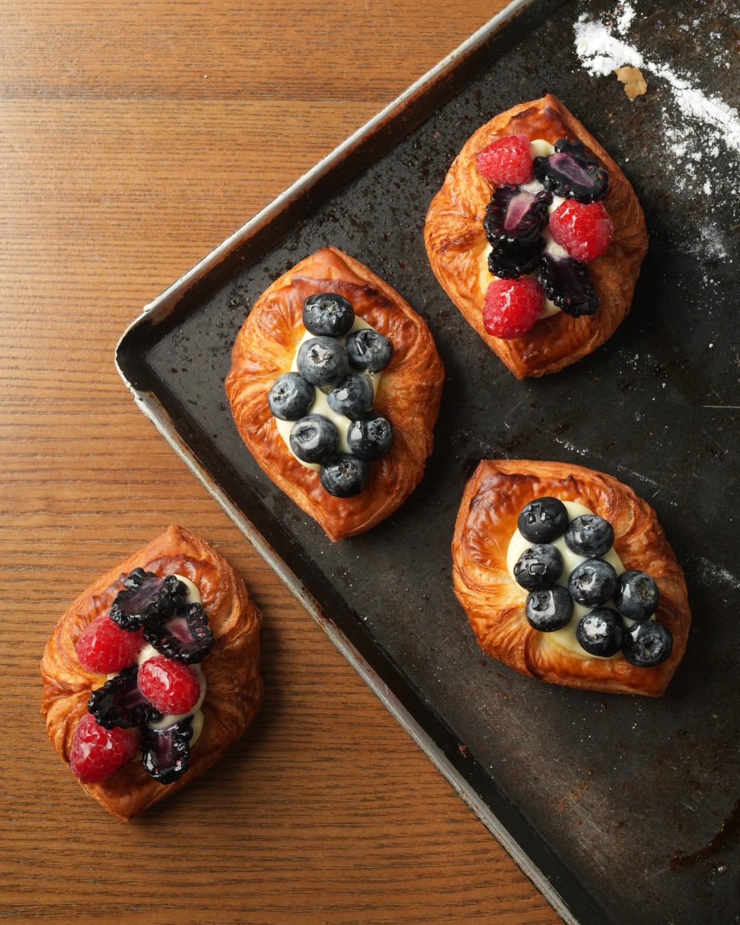 The Baker & The Bottleman — Black Sesame Mochi Croissant + Danish duo for HK$50. Limited daily stock, while supplies last.