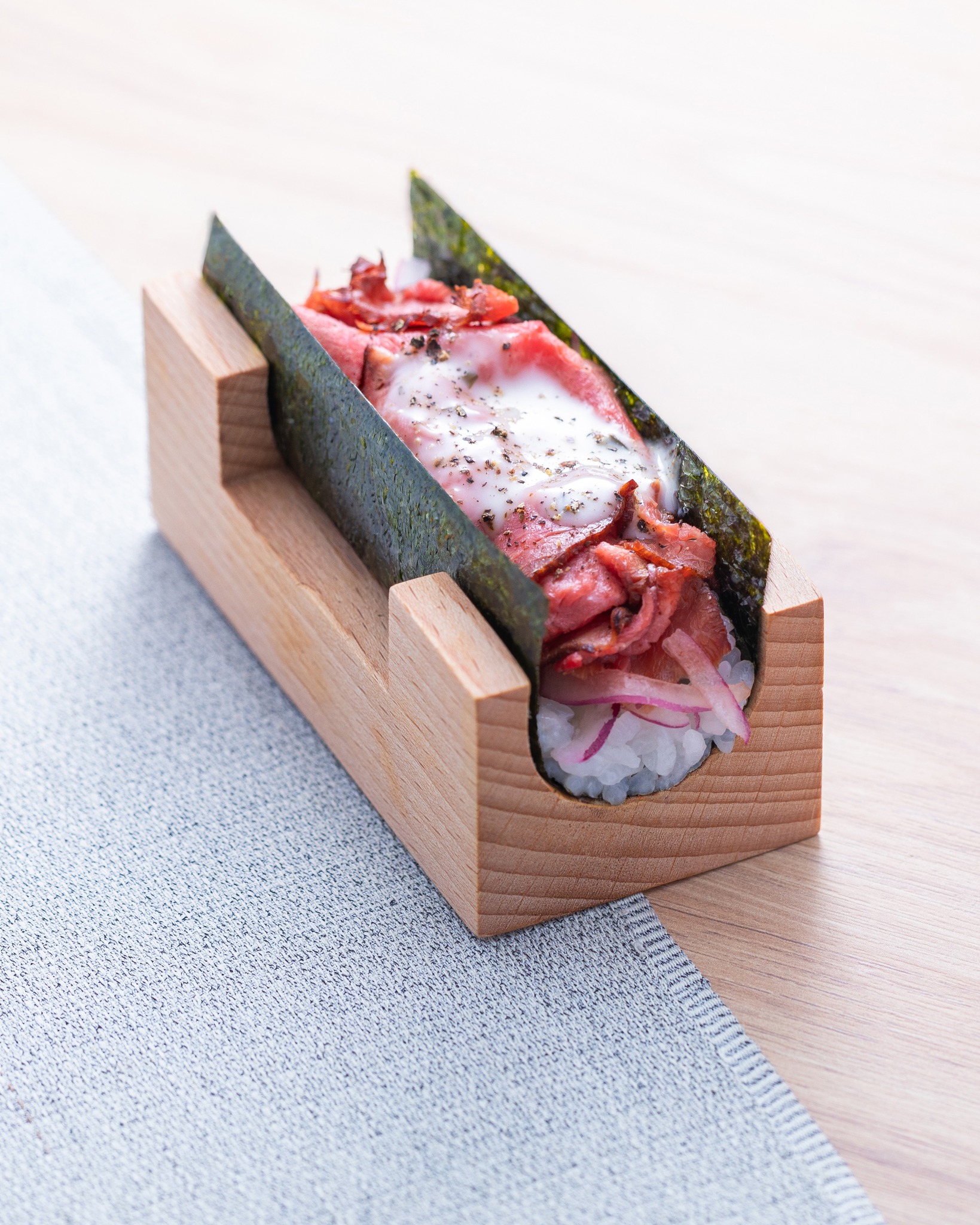 Limited-time slow-cooked beef hand roll priced at HK$25.