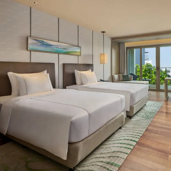 Trip.com — Luxury beachfront rooms starting from HK$710-$767 with complimentary breakfast for two at Shenzhen hotel.
