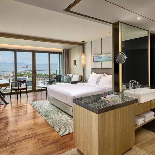 Trip.com — Luxury beachfront rooms starting from HK$710-$767 with complimentary breakfast for two at Shenzhen hotel.